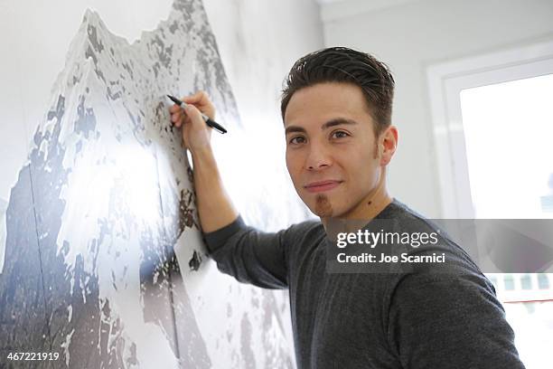 Olympian Apolo Anton Ohno visits the USA House ahead of the Sochi 2014 Winter Olympics at the Olympic Park on February 6, 2014 in Sochi, Russia.