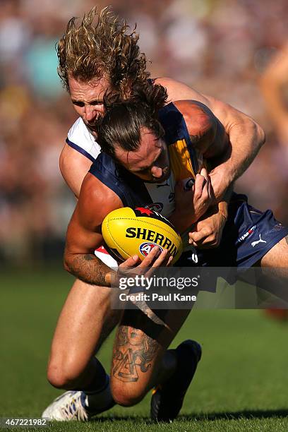 David Mundy of the Dockers tackles Chris Masten of the Eagles during the NAB Challenge AFL match between the West Coast Eagles and the Fremantle...