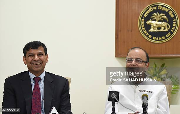 Reserve Bank of India governor, Raghuram Rajan and Indian finance minister Arun Jaitley addresses a joint press conference after a meeting with the...