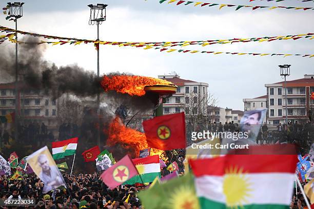 Large fire burns as Kurds from Turkey and Syria celebrate Kurdish New Year on March 21, 2015 in Diyarbakir, Turkey. Diyarbakir has one of the largest...