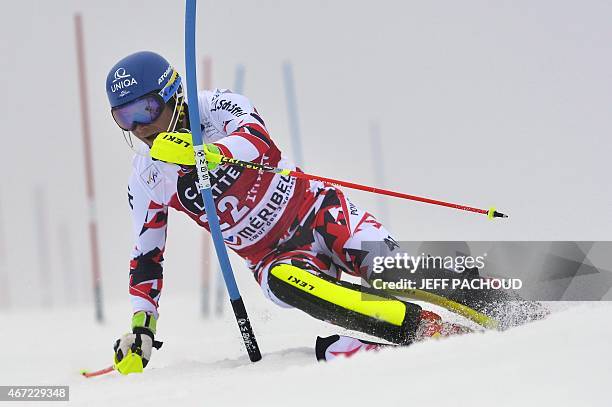 Austria's Benjamin Raich competes in the first run of the men's Slalom race at the FIS Alpine Skiing World Cup finals in Meribel on March 22, 2015....