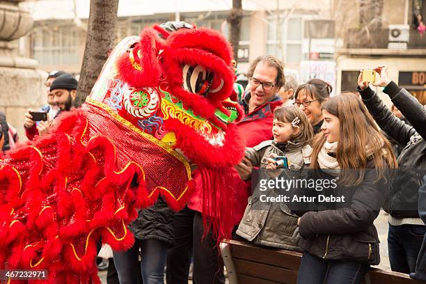 Chinese celebrate the horse New Year's in Barcelona.