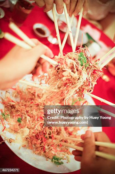 chinese new year - prosperity toss stock pictures, royalty-free photos & images