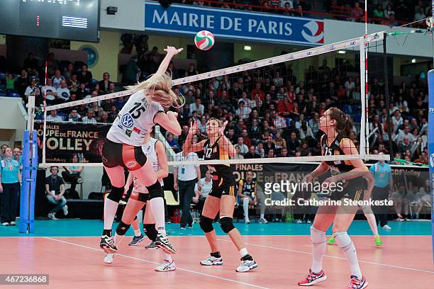 Bernarda Brcic of ES Le Cannet-Rocheville VB spikes the ball as Victoria Ravva and Logan Tom of RC Cannes try to block during the Women's Final of La...