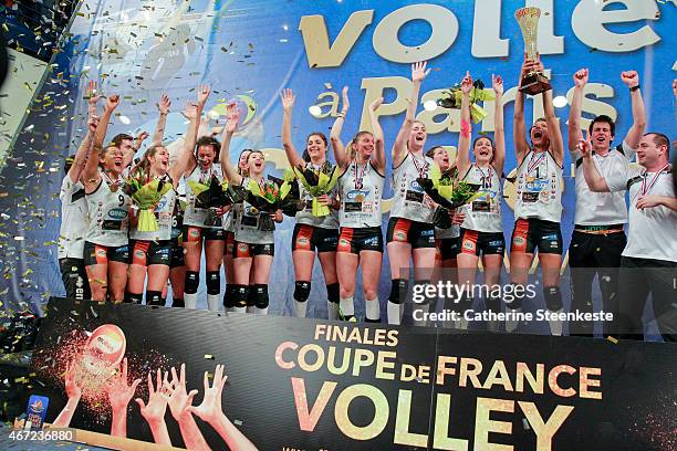 The ES Le Cannet-Rocheville VB team celebrates their victory after the Women's Final of La Coupe de France between RC Cannes and ES Le...