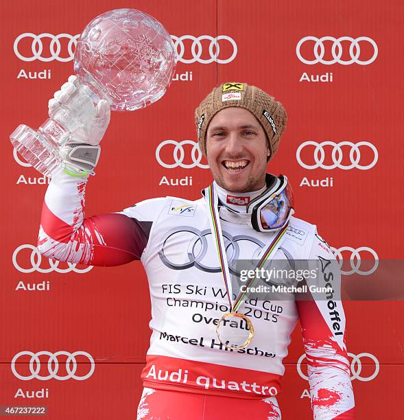 Marcel Hirscher of Austria poses with the crystal globe for the overall title after the FIS Alpine Ski World Cup men's slalom race on March 22, 2015...