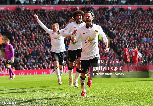 Juan Mata of Manchester United celebrates scoring his second goal during the Barclays Premier League match between Liverpool and Manchester United at...