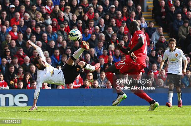 Juan Mata of Manchester United scores his second goal during the Barclays Premier League match between Liverpool and Manchester United at Anfield on...