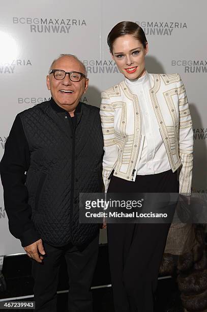 Designer Max Azria and model Coco Rocha pose backstage at BCBGMAXAZRIA fashion show during Mercedes-Benz Fashion Week Fall 2014 at The Theatre at...