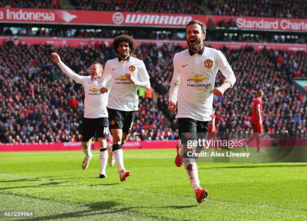 Juan Mata of Manchester United celebrates scoring his second goal during the Barclays Premier League match between Liverpool and Manchester United at...