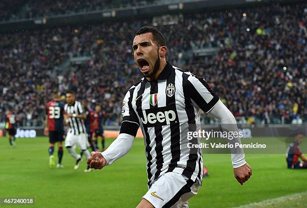 Carlos Tevez of Juventus FC celebrates after scoring the opening goal during the Serie A match between Juventus FC and Genoa CFC at Juventus Arena on...