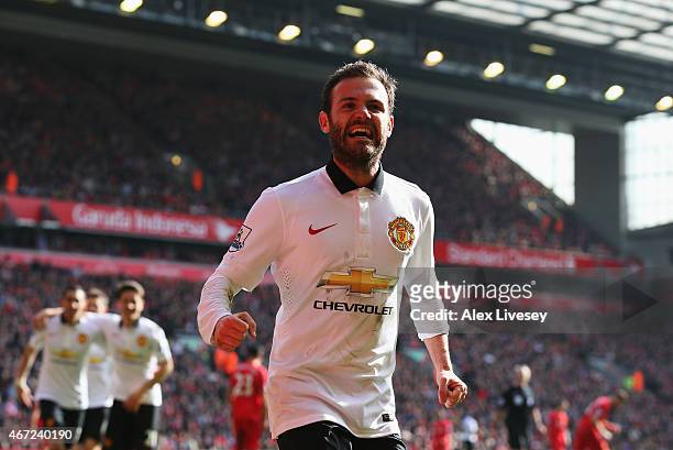 Juan Mata of Manchester United celebrates scoring his second goal during the Barclays Premier League match between Liverpool and Manchester United at...