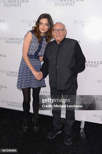 Actress Phoebe Tonkin and designer Max Azaria pose backstage at BCBGMAXAZRIA fashion show during Mercedes-Benz Fashion Week Fall 2014 at The Theatre...