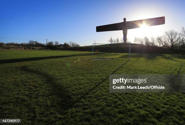 The Angel of the North is seen in silhouette prior to the Barclays Premier League match between Newcastle United and Sunderland at St James' Park on...