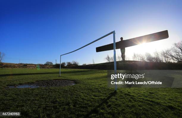 The Angel of the North is seen in silhouette prior to the Barclays Premier League match between Newcastle United and Sunderland at St James' Park on...