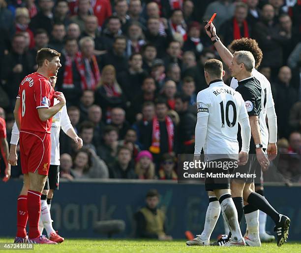 Steven Gerrard of Liverpool is sent off by referee Martin Atkinson during the Barclays Premier League match between Liverpool and Manchester United...