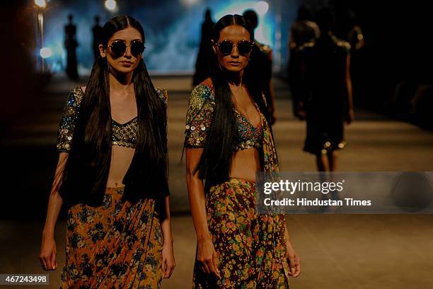 Models walk on the ramp; showcase a creation by Indian fashion designer Sabyasachi Mukherjee during the Lakme Fashion Week Summer/Resort 2015 on day...