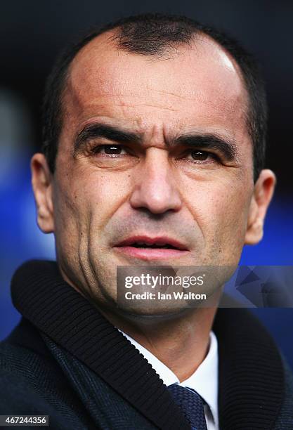 Roberto Martinez, manager of Everton looks on during the Barclays Premier League match between Queens Park Rangers and Everton at Loftus Road on...