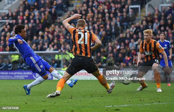 Loic Remy of Chelsea beats Michael Dawson of Hull City to score their third goal during the Barclays Premier League match between Hull City and...