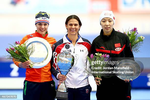 Gold medalist Brittany Bowe of the USA , Silver medalist Marrit Leenstra of the Netherlands and Bronze medalist Qishi Li of China pose for a photo...