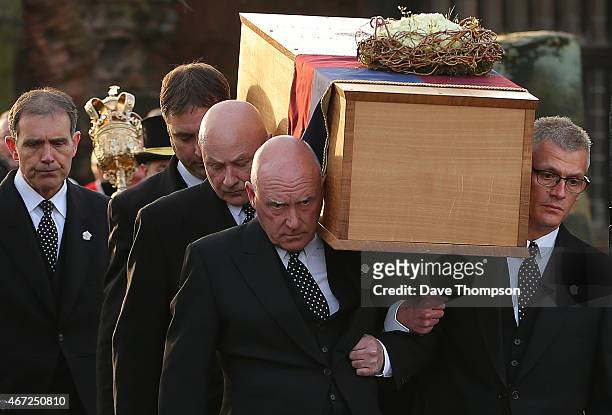 The coffin containing the remains of King Richard III is carried by pallbearers from St Nicholas Church during a procession through Leicester City...
