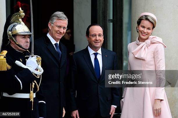 King Philippe of Belgium and Queen Mathilde of Belgium meet French president Francois Hollande during a one day official visit to Paris at the Elysee...