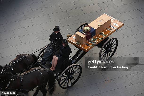 The coffin containing the remains of King Richard III is carried in procession for interment at Leicester Cathedral on March 22, 2015 in Leicester,...