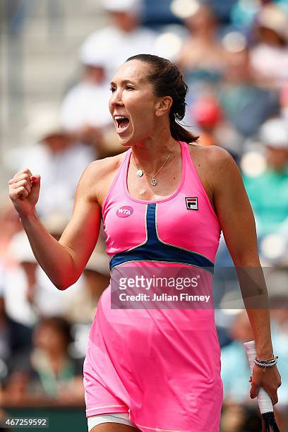 Jelena Jankovic of Serbia celebrates in her match against Simona Halep of Romania in the final during day fourteen of the BNP Paribas Open tennis at...