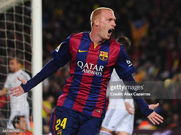 Jeremy Mathieu of Barcelona celebrates as he scores their first goal with a header during the La Liga match between FC Barcelona and Real Madrid CF...