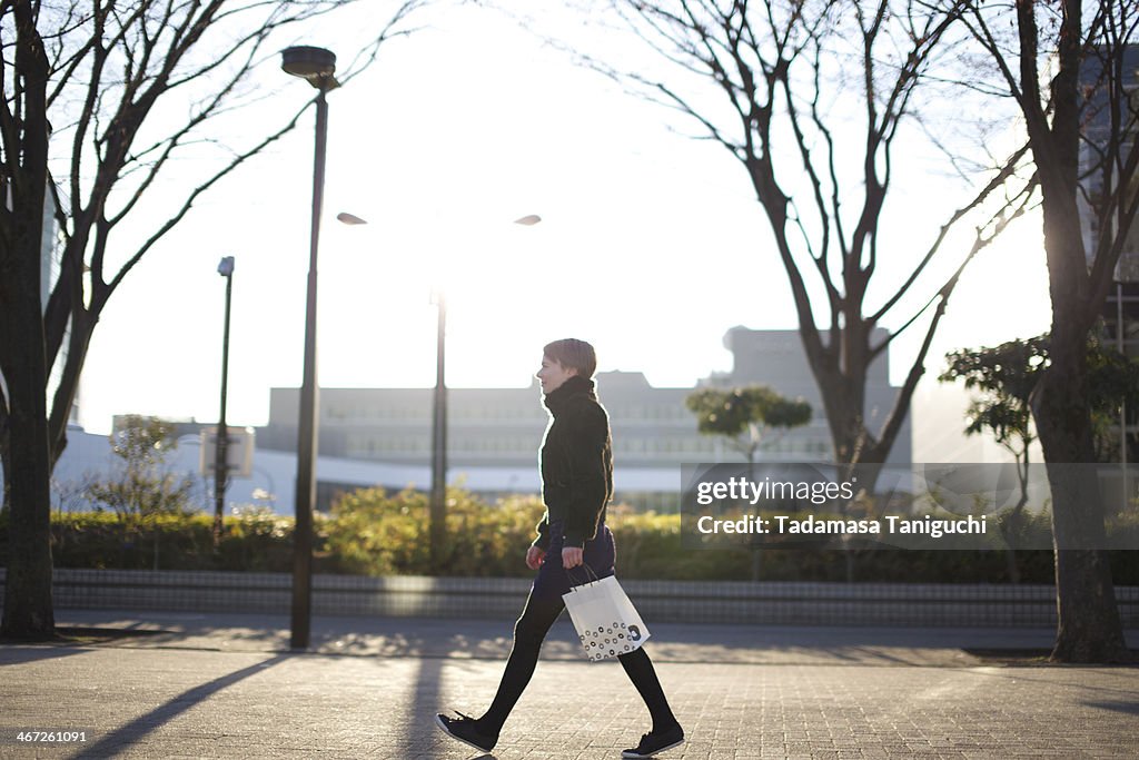 Woman walking on the street