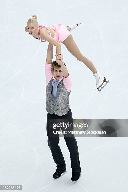 Stacey Kemp and David King of Great Britain compete in the Figure Skating Pairs Short Program during the Sochi 2014 Winter Olympics at Iceberg...