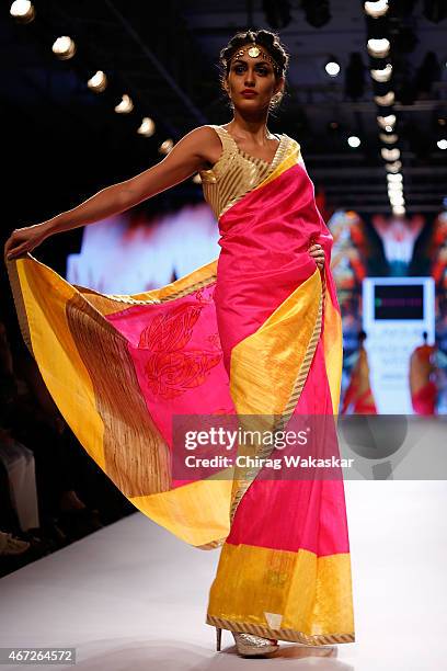 Model walks the runway during the Mandira Bedi show on day 5 of Lakme Fashion Week Summer/Resort 2015 at Palladium Hotel on March 22, 2015 in Mumbai,...