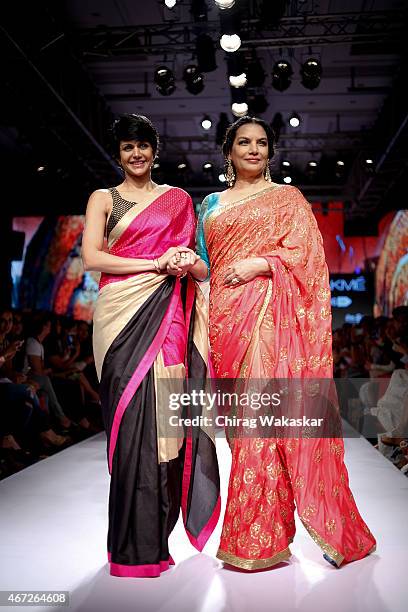 Shabana Azmi walks the runway with Mandira Bedi on day 5 of Lakme Fashion Week Summer/Resort 2015 at Palladium Hotel on March 22, 2015 in Mumbai,...
