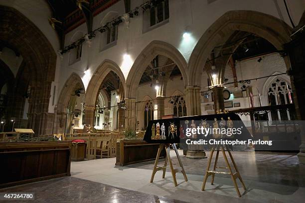 The coffin containing the remains of King Richard III is draped in a specially-embroidered 'pall' and adorned with a crown as it sits in repose...