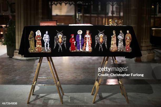 The coffin containing the remains of King Richard III is draped in a specially-embroidered 'pall' and adorned with a crown as it sits in repose...