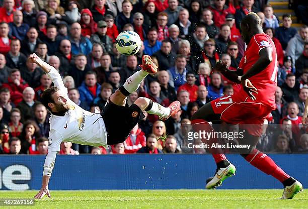 Juan Mata of Manchester United scores his second goal during the Barclays Premier League match between Liverpool and Manchester United at Anfield on...