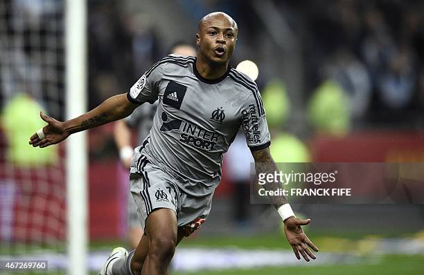 Marseille's Ghanaian forward Andre Ayew celebrates after scoring a goal during the French L1 football match between Lens and Marseille on March 22,...