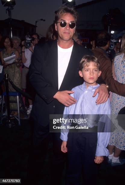 Actor Don Johnson and Melanie Griffith's son Alexander Bauer attend the "Tin Cup" Westwood Premiere on August 1, 1996 at the Mann Village Theatre in...