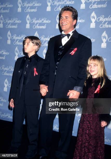 Actor Don Johnson, Melanie Griffith's son Alexander Bauer and daughter Dakota Johnson attend the 23rd Annual People's Choice Awards on January 12,...