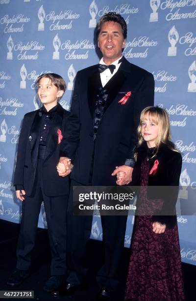 Actor Don Johnson, Melanie Griffith's son Alexander Bauer and daughter Dakota Johnson attend the 23rd Annual People's Choice Awards on January 12,...