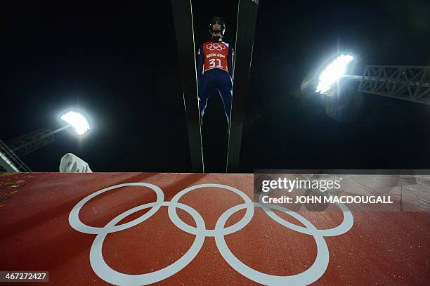 Czech Republic's Lukas Hlava competes during the Men's Ski Jumping Normal Hill Individual Official first Training at the RusSki Gorki Jumping Center...