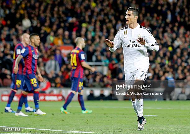 Cristiano Ronaldo of Real Madrid celebrates after scoring their first goal during the La Liga match between FC Barcelona and Real Madrid CF at Camp...