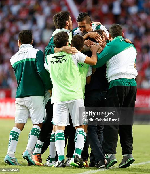Matias Almeyda and teammates celebrate their team's second goal converted by Juan Cazares of Banfield during a match between Estudiantes and Banfield...