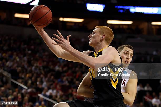 Aaron White of the Iowa Hawkeyes shoots the ball over Kyle Wiltjer of the Gonzaga Bulldogs in the first half of the game during the third round of...