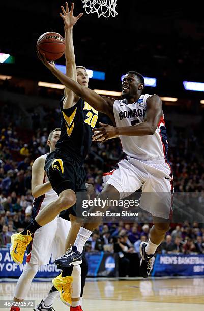 Gary Bell Jr. #5 of the Gonzaga Bulldogs shoots the ball against Jarrod Uthoff of the Iowa Hawkeyes in the first half of the game during the third...