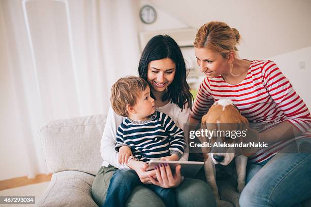 unsere süße familie - lesbe stock-fotos und bilder