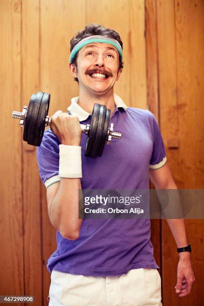 man using dumbel - exercise humour stock pictures, royalty-free photos & images