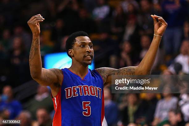 Kentavious Caldwell-Pope of the Detroit Pistons reacts after scoring a three point basket during overtime against the Boston Celtics at TD Garden on...