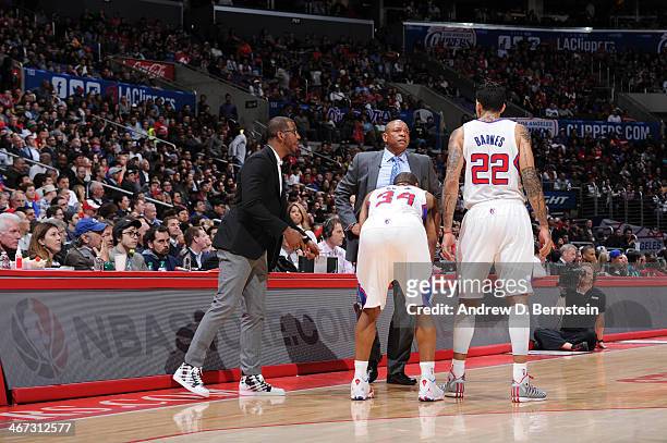 Chris Paul and Doc Rivers of the Los Angeles Clippers direct Willie Green and Matt Barnes of the Los Angeles Clippers against the Miami Heat at...