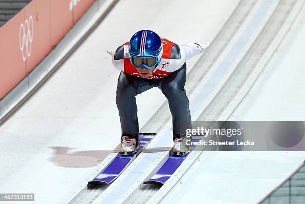 Thomas Diethart of Austria takes part in the Men's Normal Hill Individual Ski Jumping training ahead of the Sochi 2014 Winter Olympics at the RusSki...